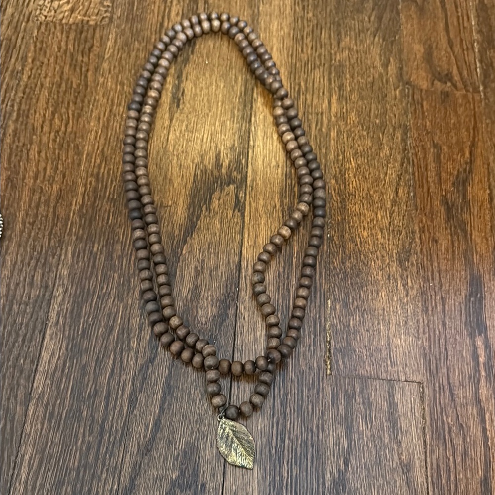Brown Beaded Necklace with Leaf Pendant